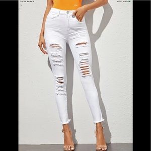 WHITE HIGH-WAISTED DISTRESSED RAW HEM SKINNY JEANS